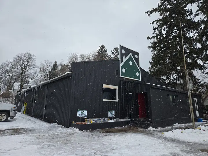Completed roof on building during winter